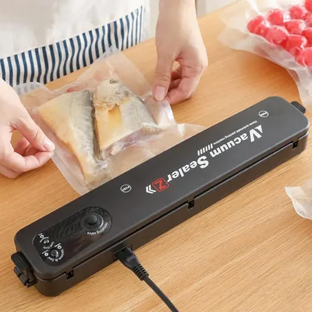 Vacuum sealer / جهاز غلق و شفط الهواء من الأكياس