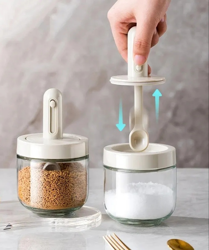 Kitchen storage glass with telescopic spoon