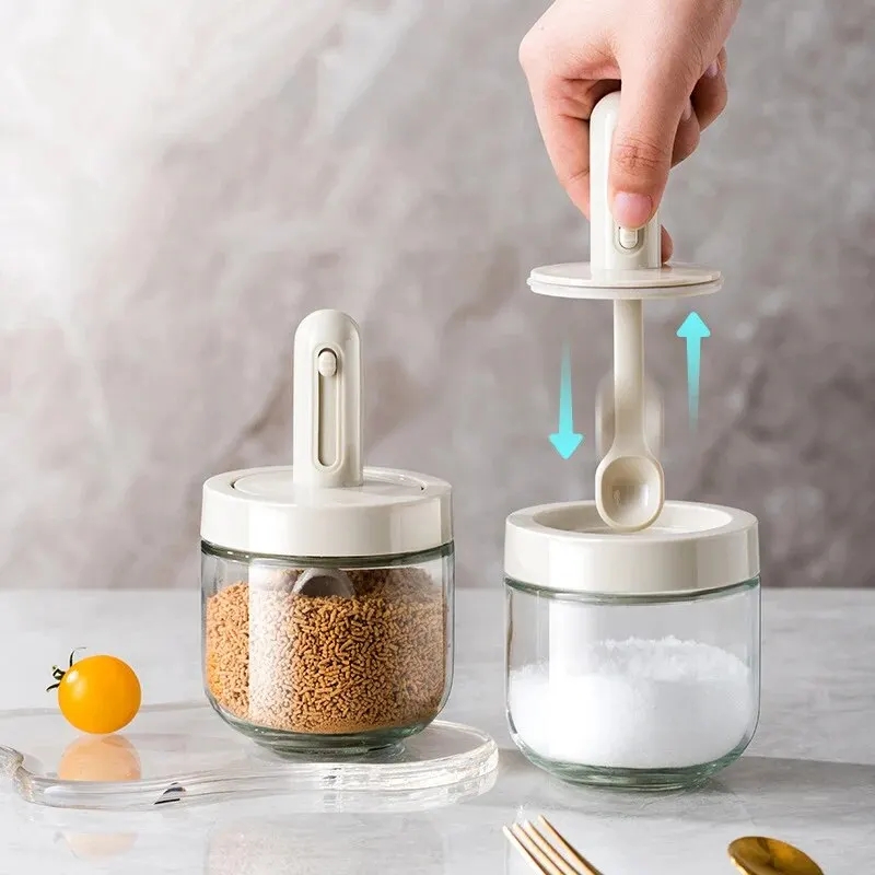 Kitchen storage glass with telescopic spoon