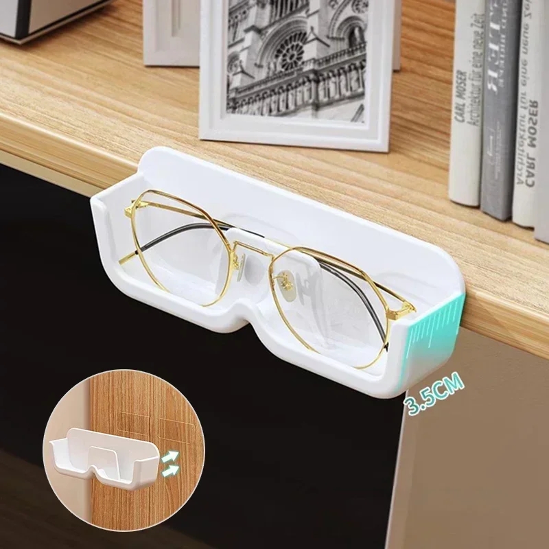 Self-adhesive glasses holder