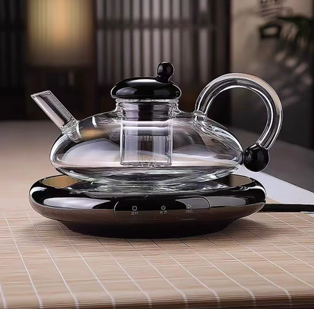 إبريق شاي زجاجي مقاوم للحرارة و موقد سيراميك كهربائي