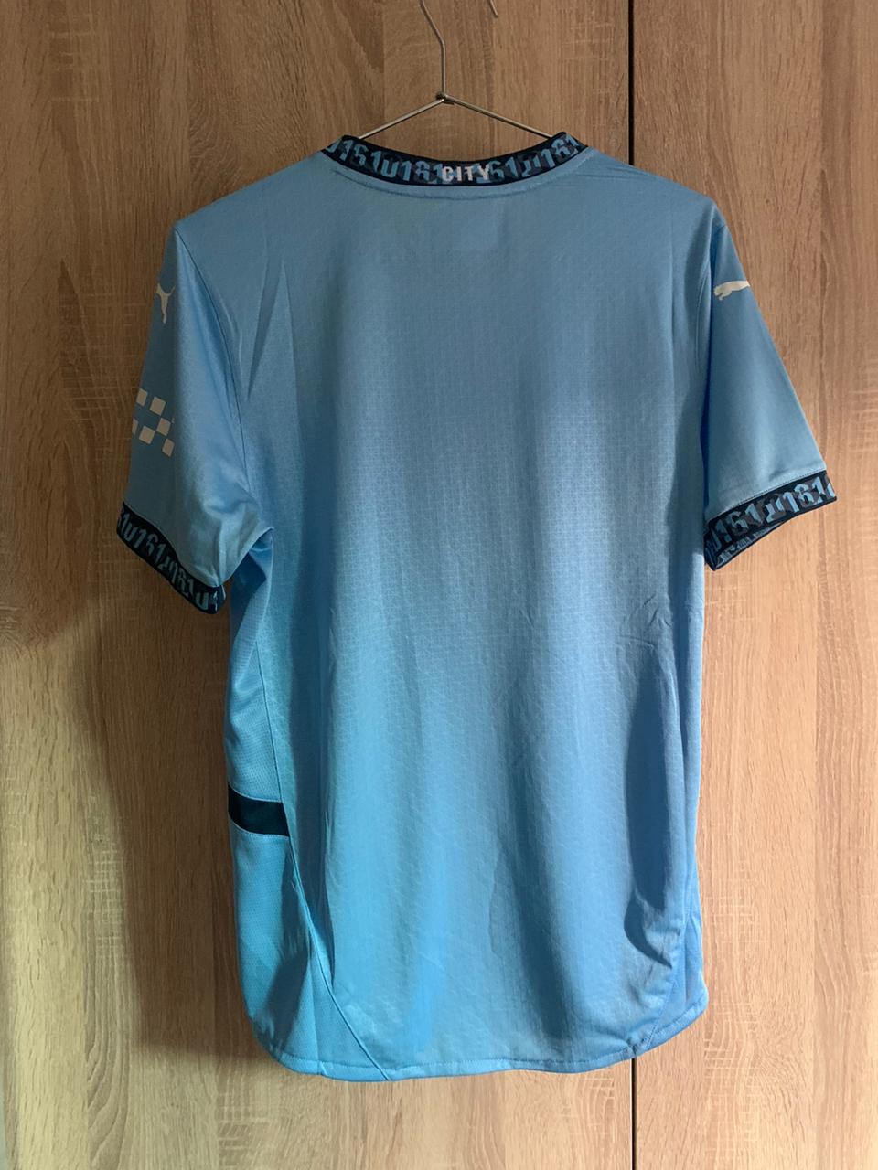 MAN CITY HOME