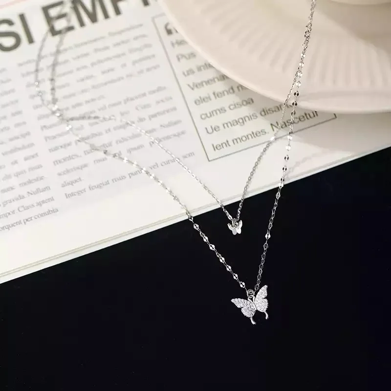 Collier papillon plomb