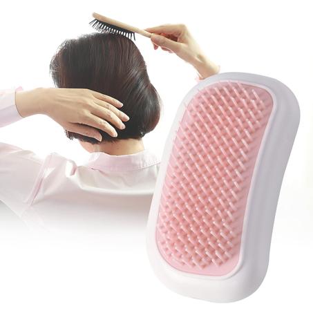 BROSSE À CHEVEUX VIBRANTE