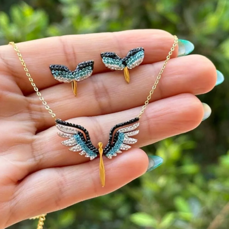 انسومبل سلسله وحلقات الاجنحه اسيي اينوكسيدابل اطلالة راقية تليق بكِ