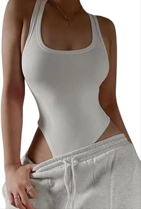 بدلة للجسم متماسكة بدون أكمام صيفية مثيرة مثيرة معطلة للكتف صد علوي غير رسمي للشارع للنساء ملابس النادي