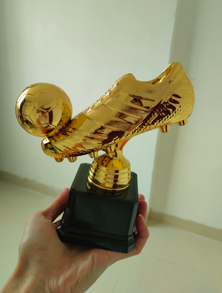 Trophée de football, chaussures dorées