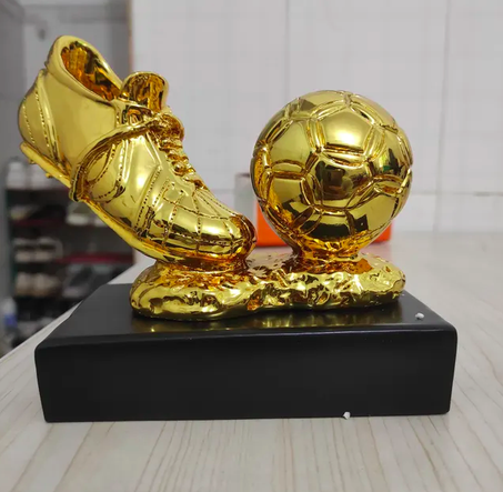 Trophée de football, chaussures dorées