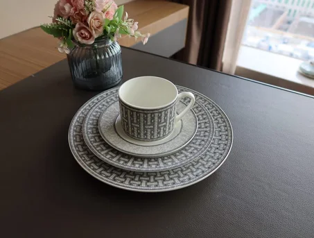 A cup of coffee with saucers