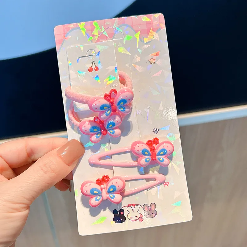 🩷​​🩵​🦋Ensemble de 2 pinces et 2 élastiques rose bleues à ornement "Papillon"🦋🩷​​🩵