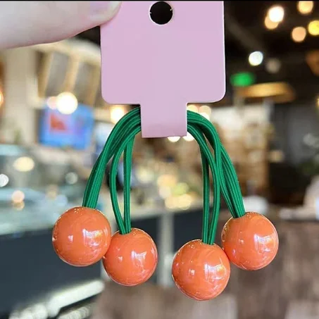 💚🧡​Set de 2 élastiques vert avec boules décoratives orange💚🧡