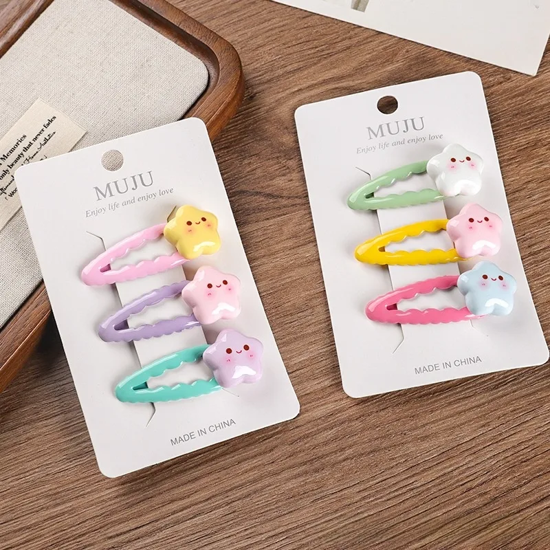 💫​​✨🩵​💚💛​💜​🩷​​​Pack de 3 pinces ondulées à ornements "Etoiles souriantes" couleurs mixtes🩵​💚💛​💜​🩷💫​​✨