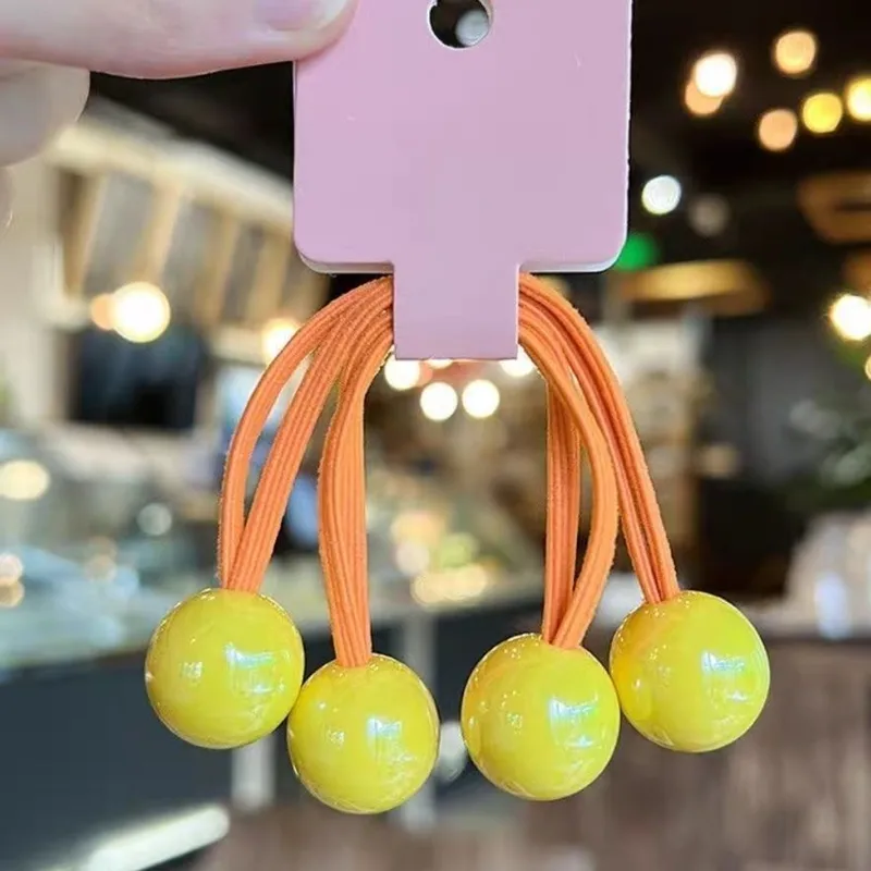 🧡💛​Set de 2 élastiques orange avec boules décoratives jaune🧡💛