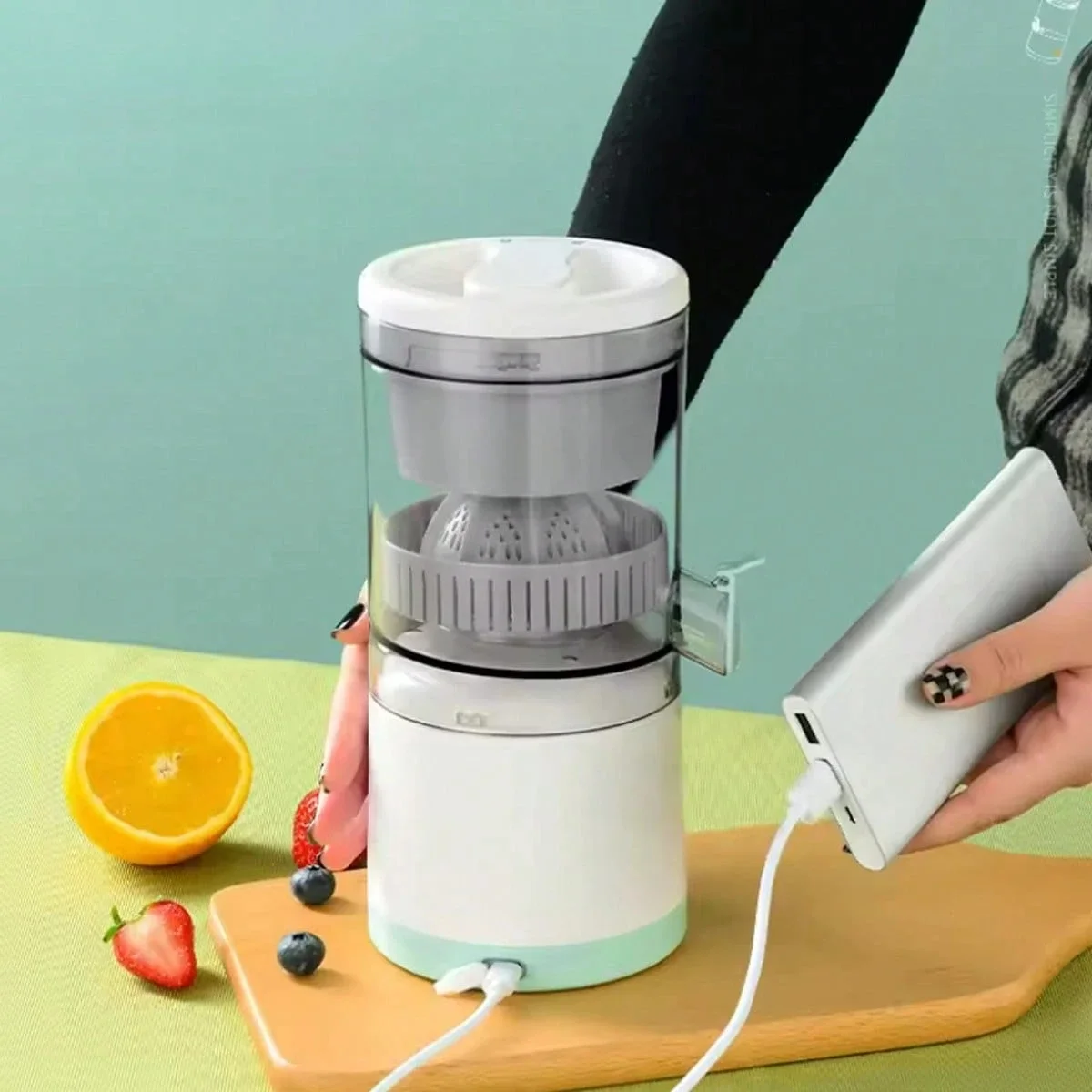 عصّارة برتقال كهربائية محمولة