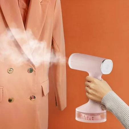 مكواة بخار محمولة للملابس (لون وردي)