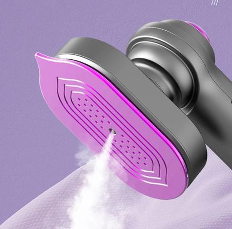 مكواة صغيرة محمولة بالبخار