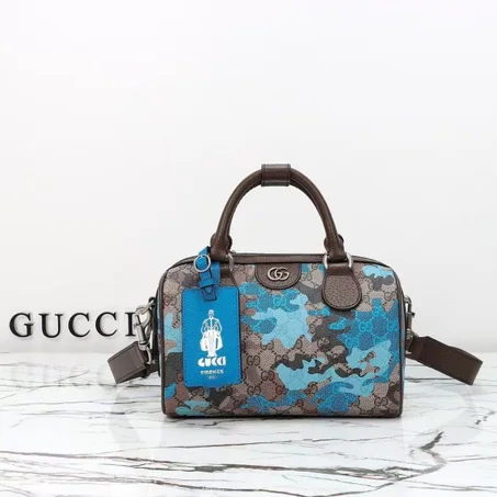 sac polochon GG format petit ou moyen à motif camouflage bleu