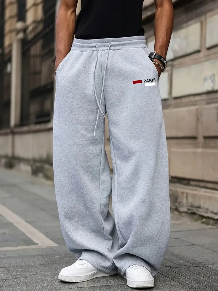 Men's solid-color loose-fitting sports pants, with front drawstrings and pocket design - casual