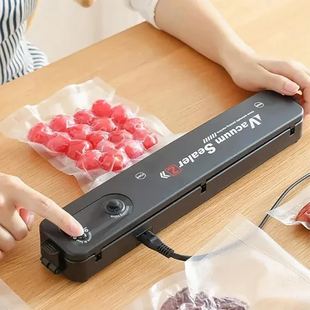 Vacuum sealer  -  آلة تغليف الأكل