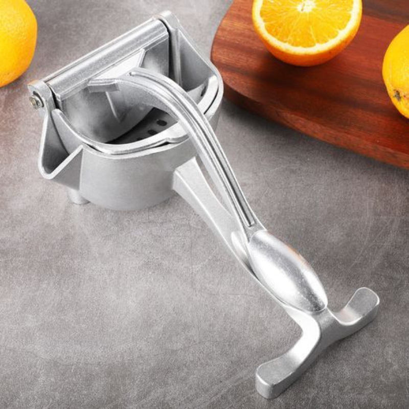 عصارة فواكه يدوية - Presse-fruits manuel
