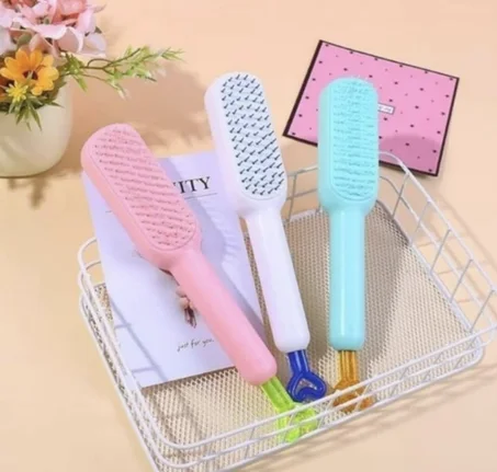 Brosse cheveux retractable top qualité avec auto-nettoyage مشط الشعر بتصميم رائع و جودة عالية مع خاصية التنظيف الذاتي