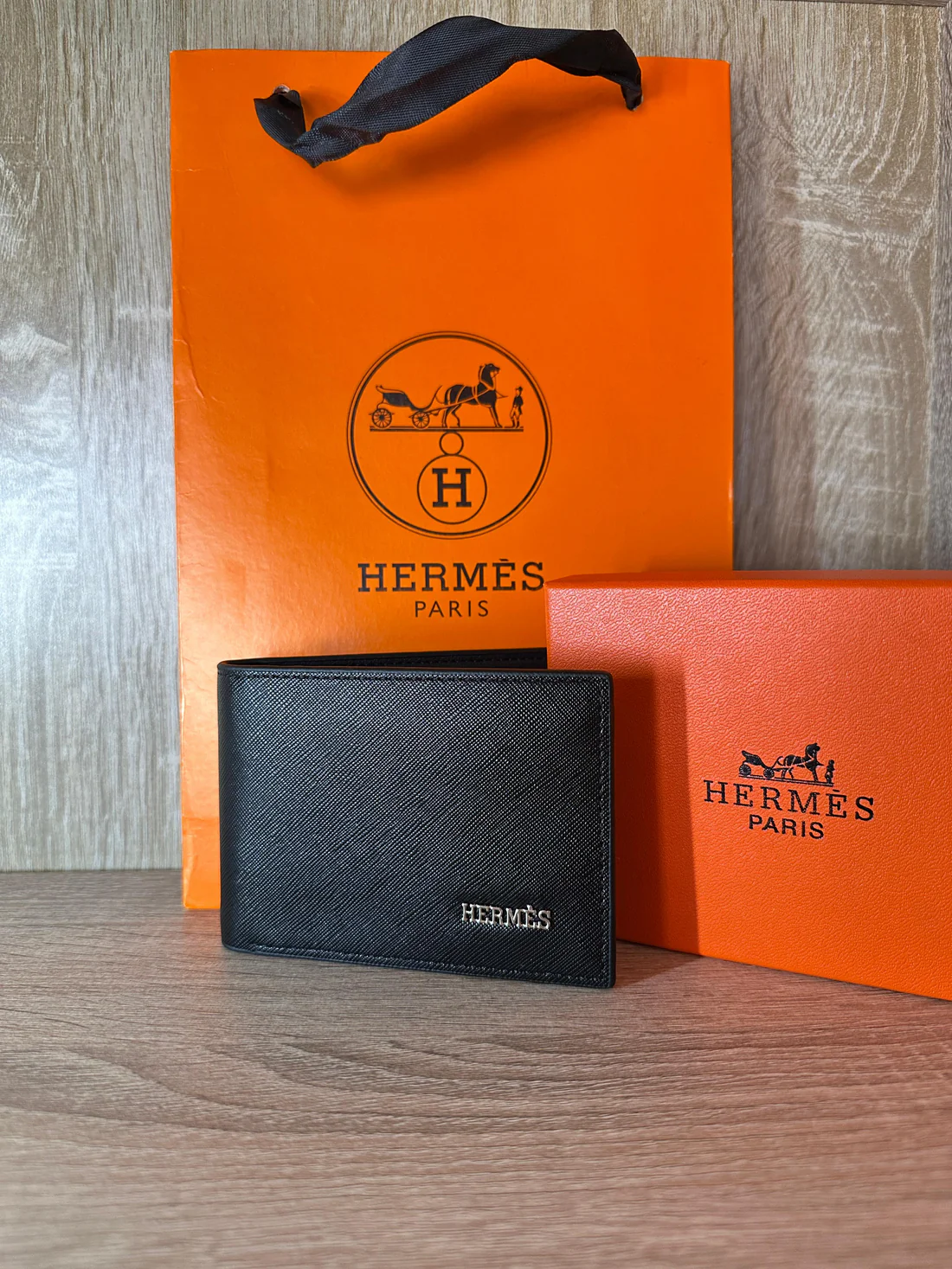 PORTE FEUILLE HERMES NOIR