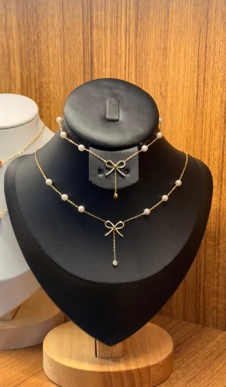 طقم عقد وأقراط أنيق مزين باللؤلؤ وتصميم عقدة رقيق💎