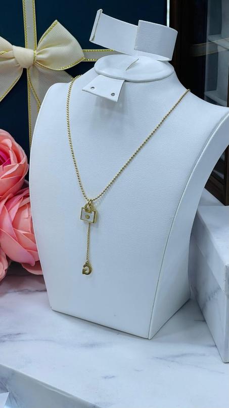 Collier Pendentif avec un Petit Sac à Main