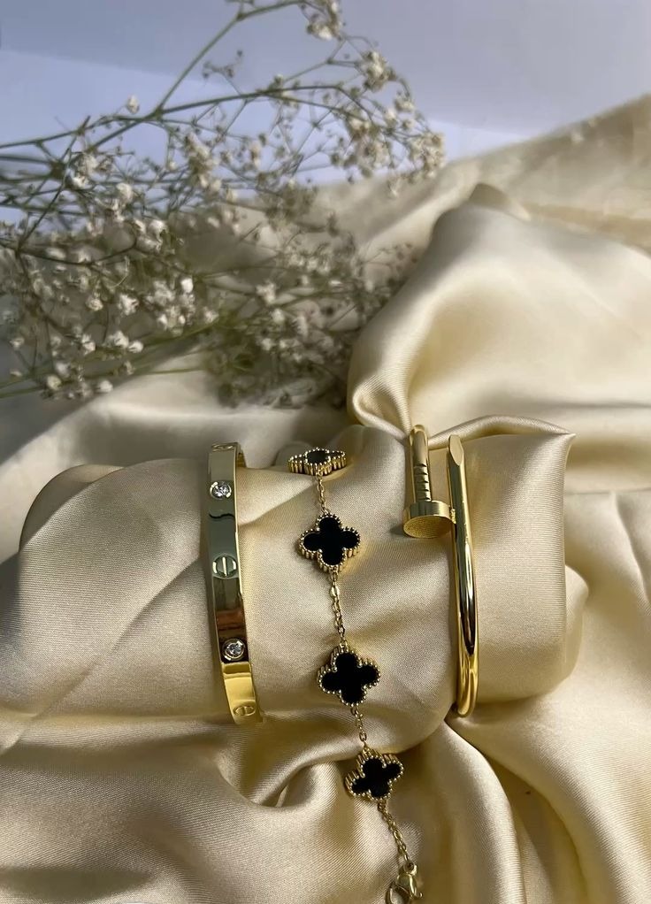 2 BRACELETS CARTIER + VAN CLEEF- NOIR