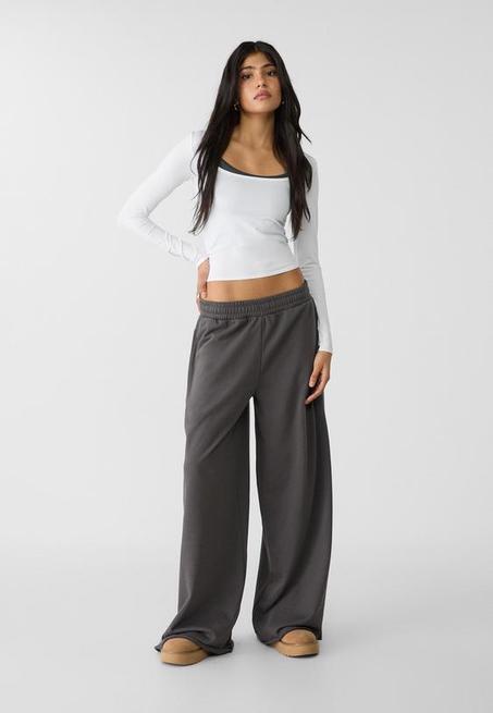 Pantalon molleton jambes larges liseré