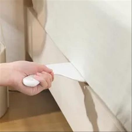 أداة يدوية لترتيب الأفرشة