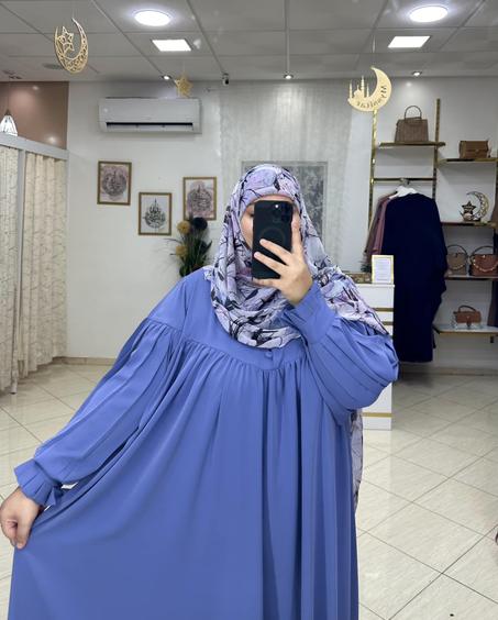 14- فستان عفراء ...فستان بثوب كريب حرير، بقصة فضفاضة ومريحة لعاشقات السترة و الجودة الممتازة