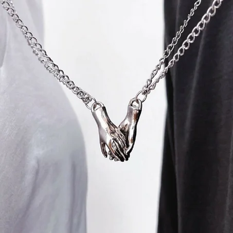 Collier magnétique pendentif à main