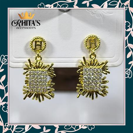 ✨ أقراط أشعة الشمس الفاخرة