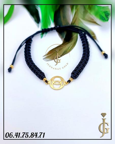 CORDON CHANNEL AVEC  4 BOULES EN OR 18 CARATS