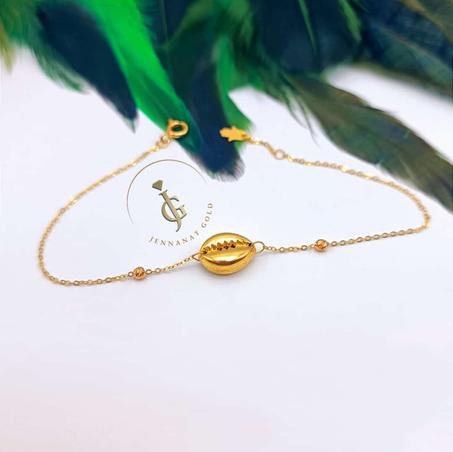 GOURMETTE COQUILLAGE  ET BOULES EN OR 18 CARATS