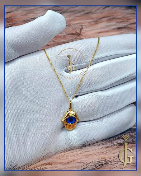 chaine pendentif oeil en or 18 kara