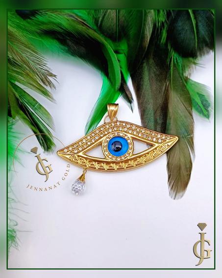 pendentif oeil en or 18 carats