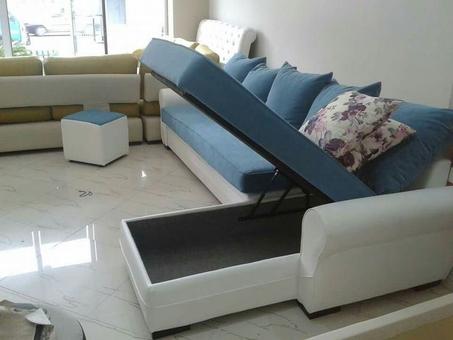 عنوان تجاري: كنبة الزاوية: مساحة وراحة وتخزين ذكي لمنزلك العصري