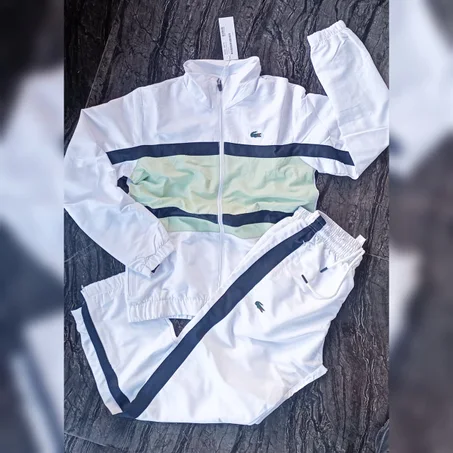 Survétement lacoste 2k25 blanche