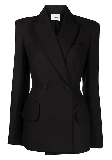 Blazer croisé noir à la coupe tailleur structurée.