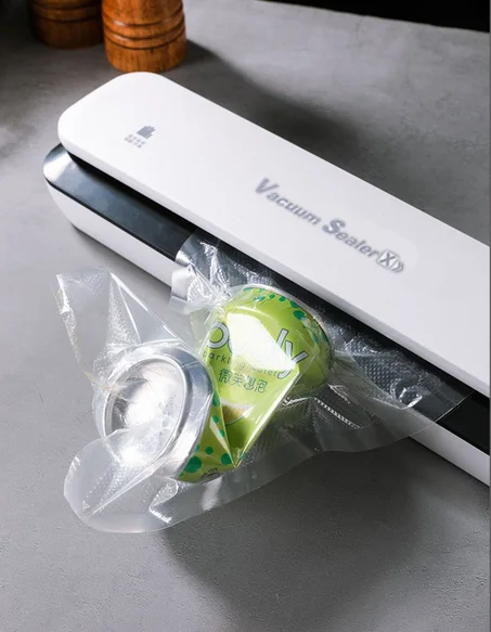 جهاز تغليف الأطعمة وتفريغ الهواء