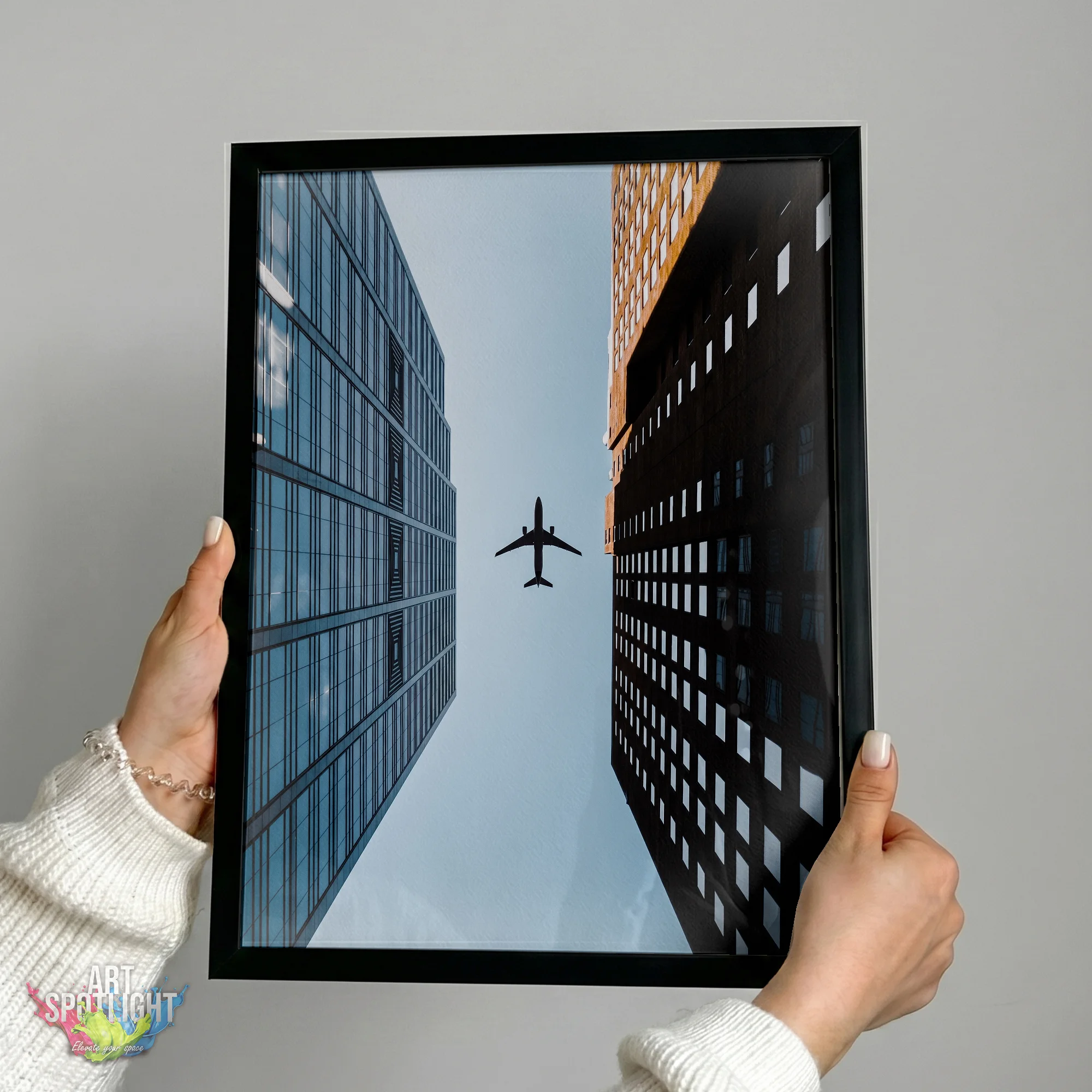 AIRPLANE BETWEEN SKYSCRAPERS