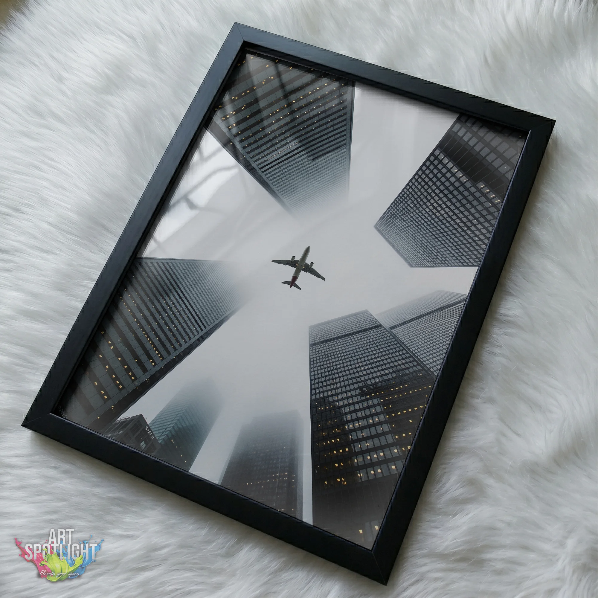 AIRPLANE ABOVE SKYSCRAPERS
