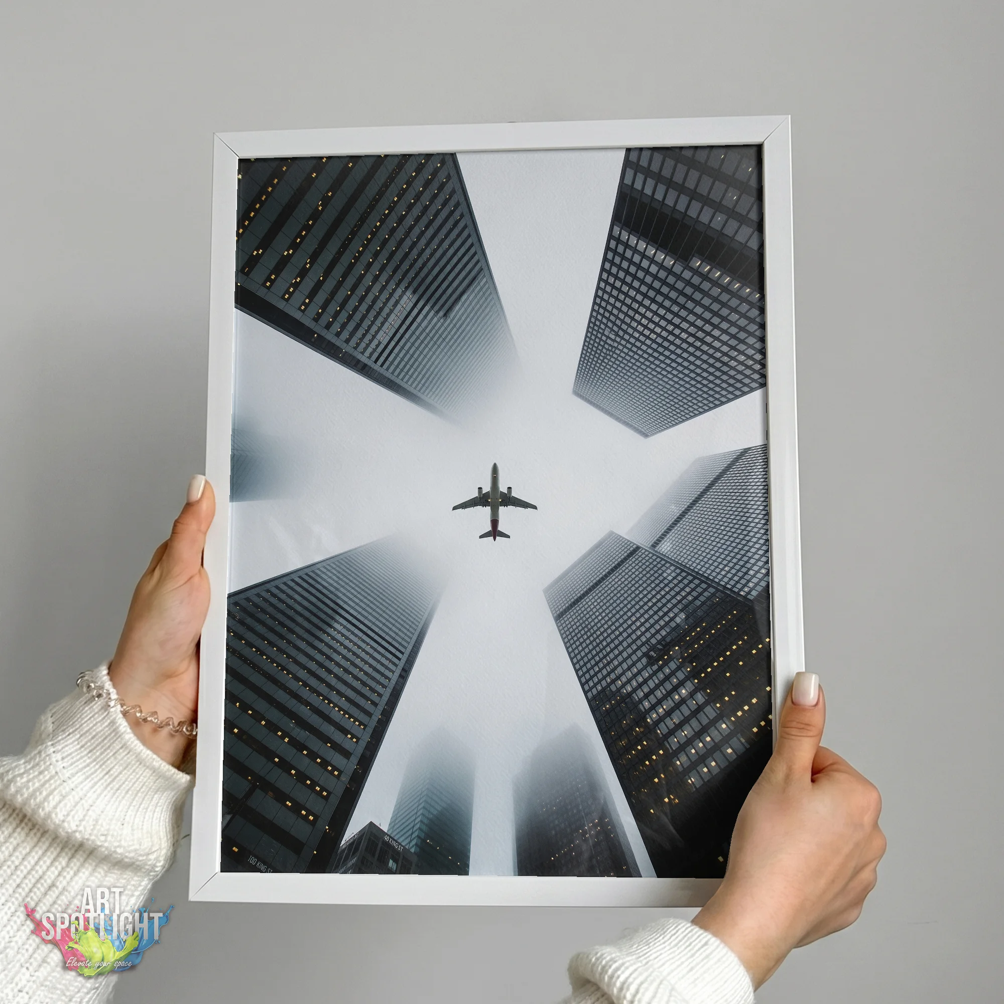 AIRPLANE ABOVE SKYSCRAPERS