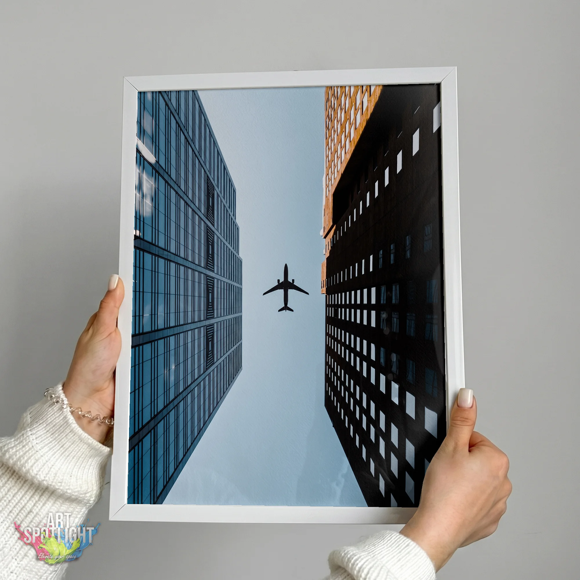 AIRPLANE BETWEEN SKYSCRAPERS