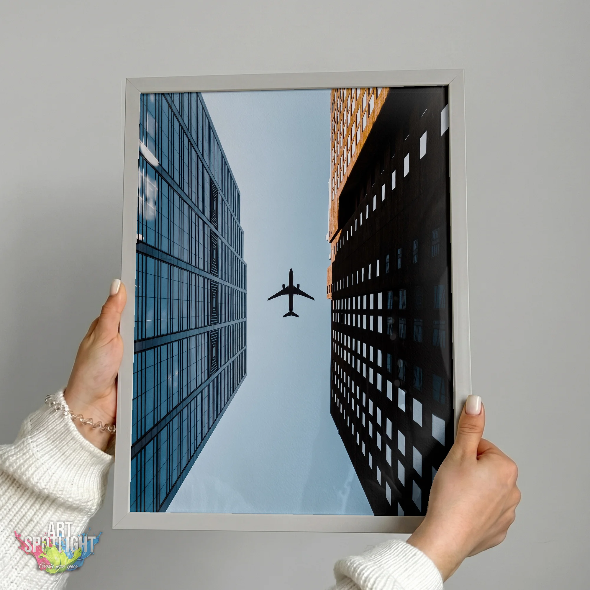 AIRPLANE BETWEEN SKYSCRAPERS