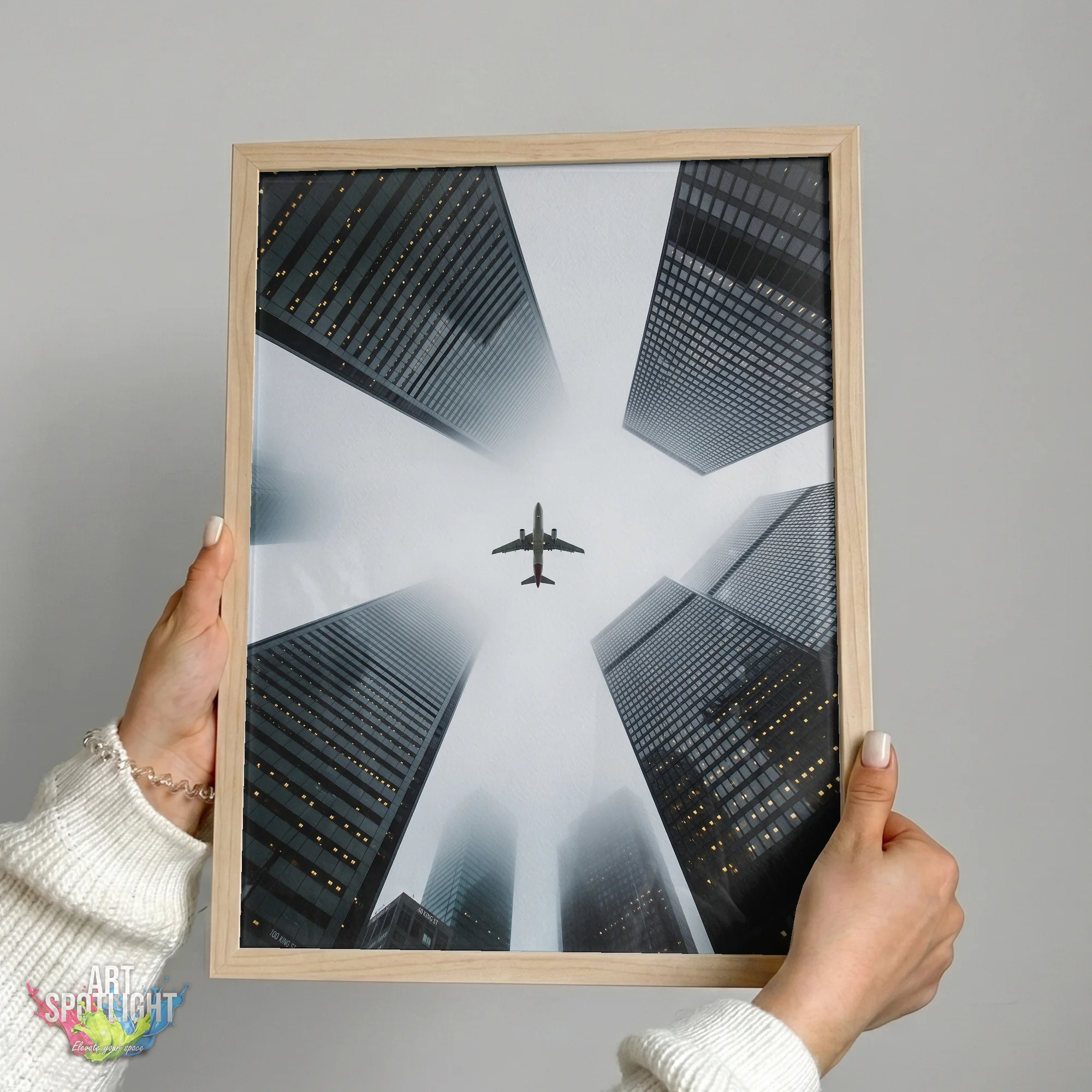AIRPLANE ABOVE SKYSCRAPERS