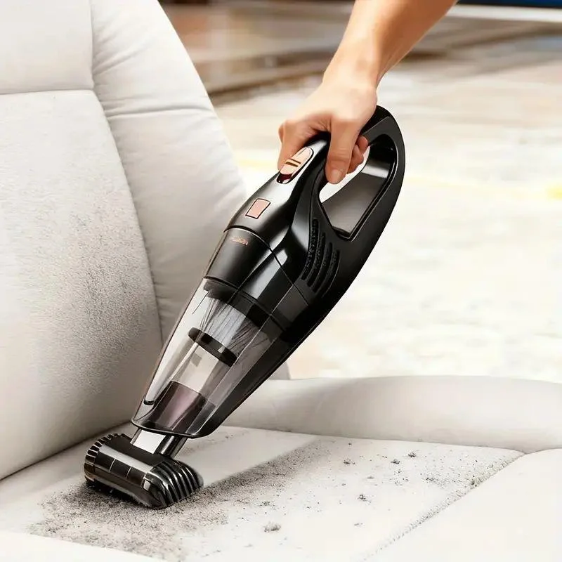 مكنسة كهربائية يدوية