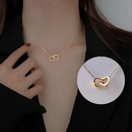 Collier reliant deux cœurs